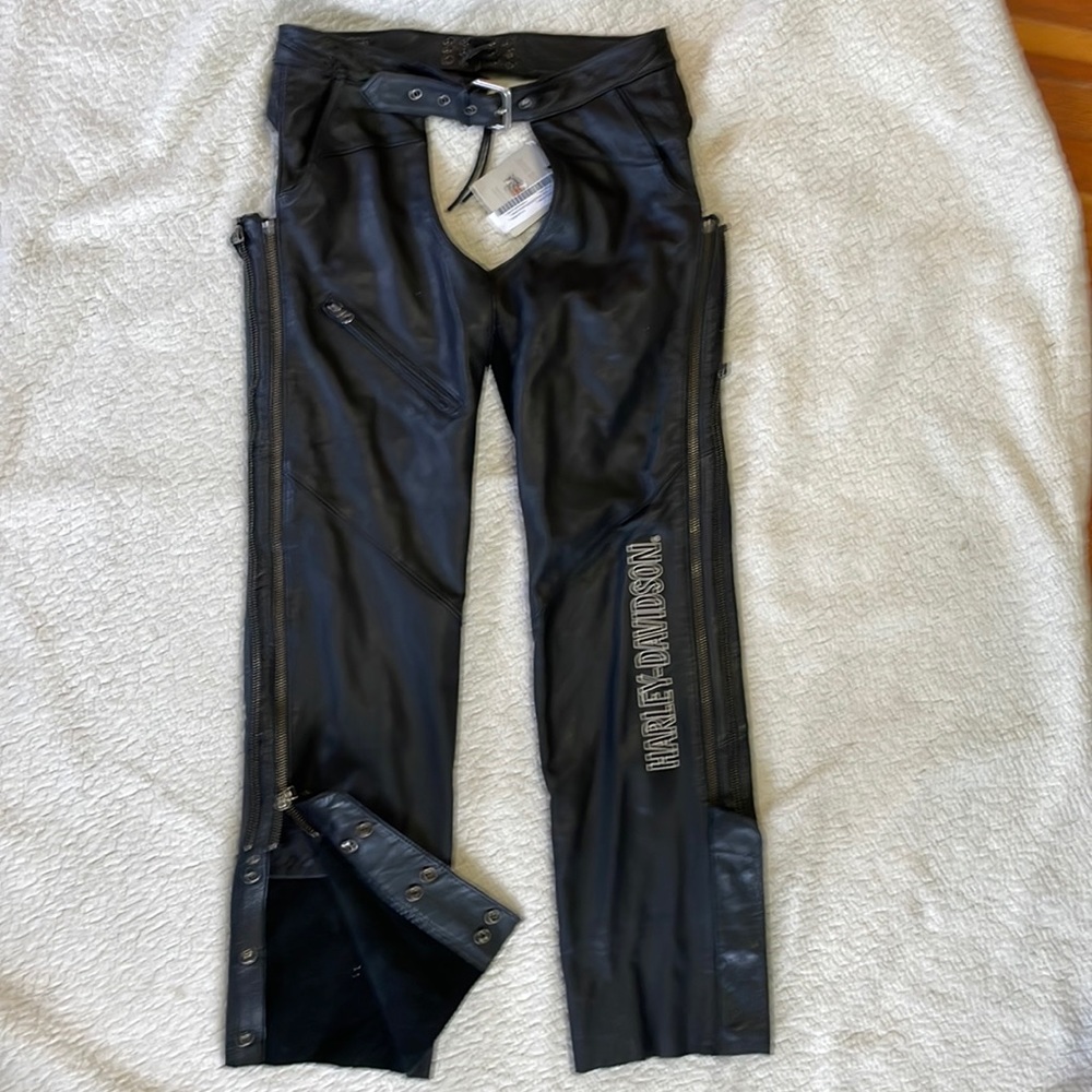 Chaps Harley Davidson tagged new. Black deluxe leather. 33”